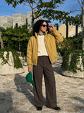 DAXUEN High-waisted wide-leg palazzo pants with pinstripes — model photo