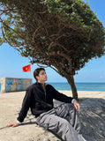 DAXUEN black and white reversible striped bomber jacket — model photo