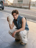 DAXUEN blue denim and leopard fleece reversible vest — model photo