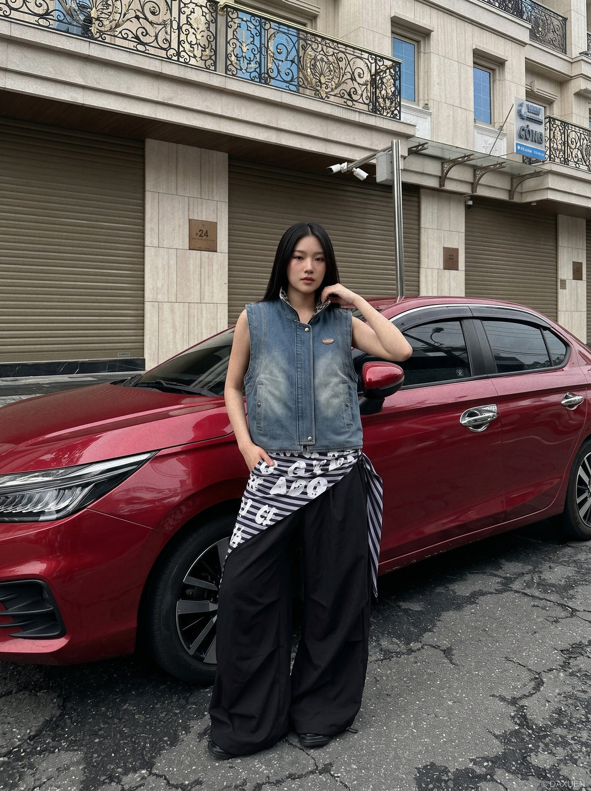 DAXUEN blue denim and leopard fleece reversible vest — model photo