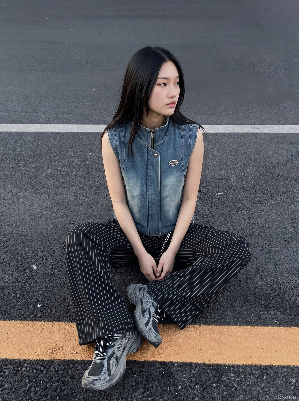 DAXUEN blue denim and leopard fleece reversible vest — model photo