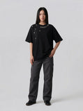 DAXUEN Oversized short-sleeve t-shirt with rhinestone embellishments — model photo