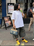 DAXUEN Oversized short-sleeve t-shirt with rhinestone embellishments — model photo