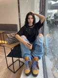 DAXUEN Oversized short-sleeve t-shirt with rhinestone embellishments — model photo