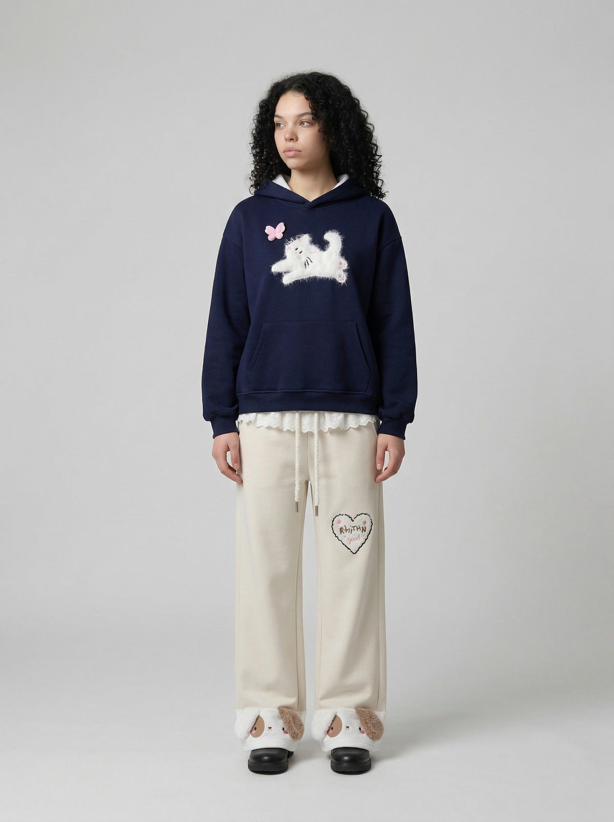 DAXUEN Wide-leg sweatpants with dog face appliqués — model photo