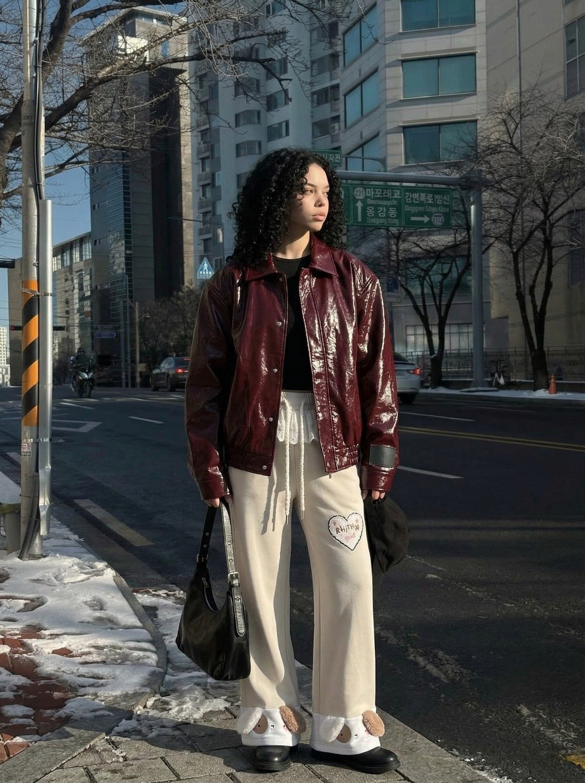 DAXUEN Wide-leg sweatpants with dog face appliqués — model photo
