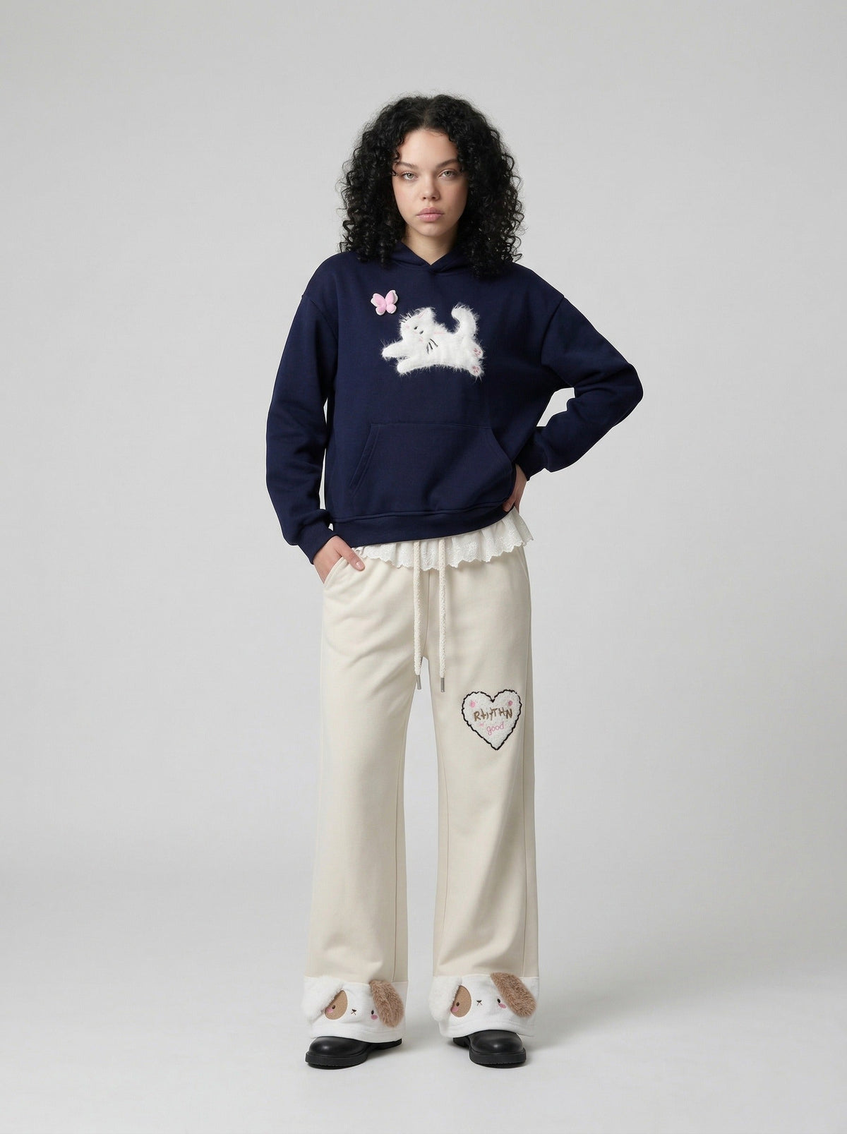 DAXUEN Wide-leg sweatpants with dog face appliqués — model photo