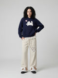 DAXUEN Wide-leg sweatpants with dog face appliqués — model photo