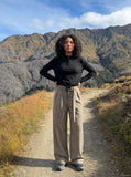 DAXUEN Ribbed long sleeve Henley top with adjustable hem — model photo