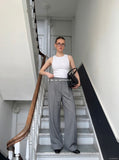 DAXUEN Men's slim-fit ribbed tank top in black and white — model photo