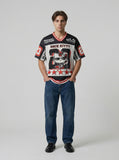 DAXUEN Black and white graphic V-neck t-shirt with red accents — model photo