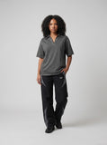DAXUEN Short-sleeved relaxed-fit polo shirt with vintage finish — model photo