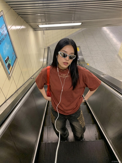 DAXUEN rust oversized mock neck graphic tee — model photo