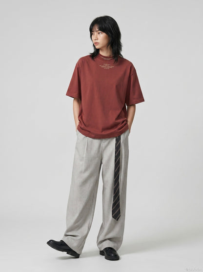 DAXUEN rust oversized mock neck graphic tee — model photo