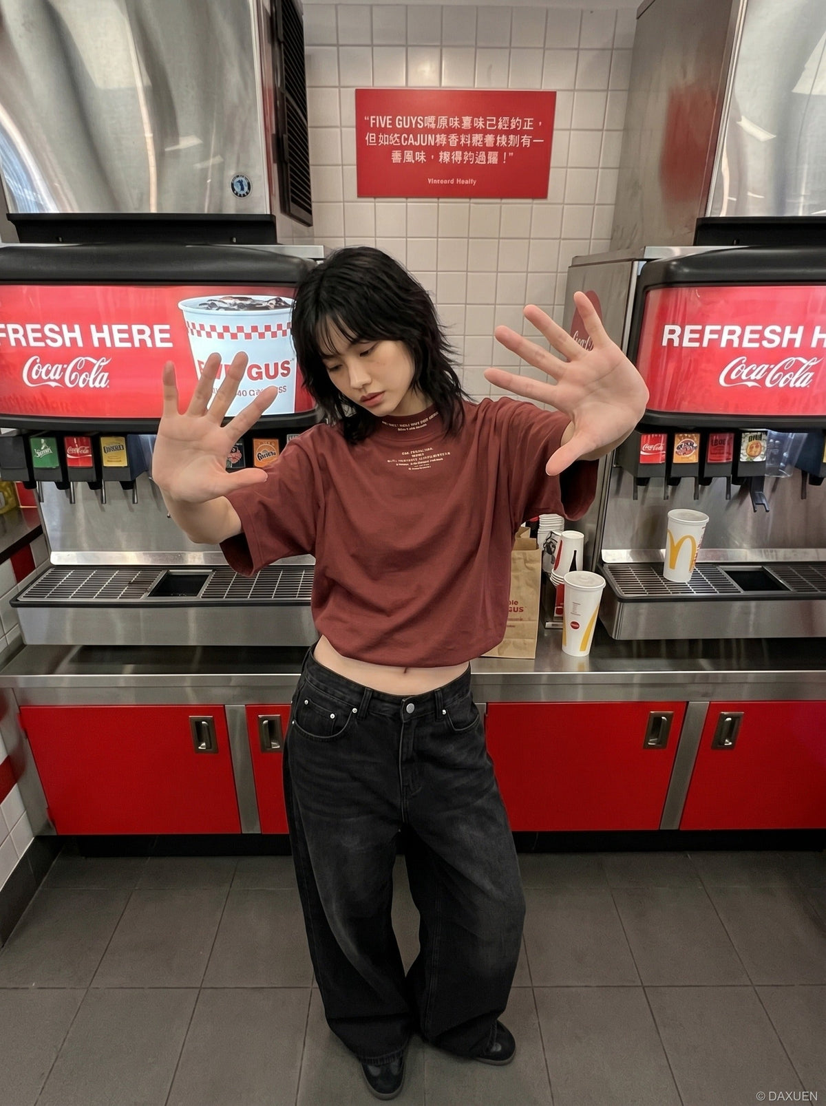 DAXUEN rust oversized mock neck graphic tee — model photo