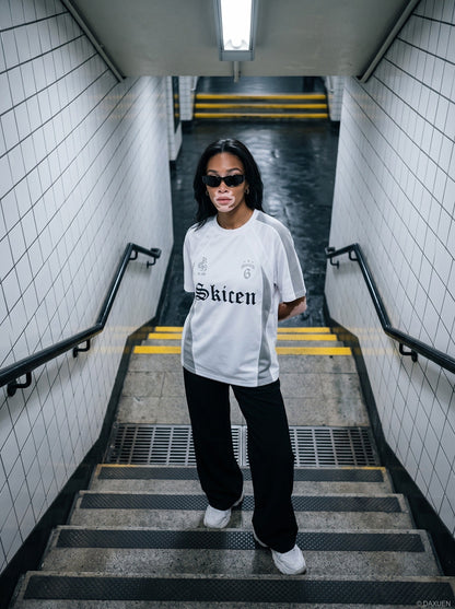 DAXUEN White oversized sports jersey T-shirt with mesh panels — model photo