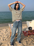 DAXUEN Striped crew neck t-shirt with embroidered text — model photo