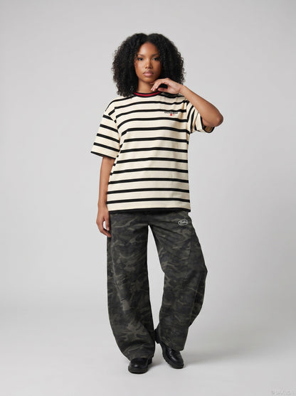 DAXUEN Striped crew neck t-shirt with embroidered text — model photo