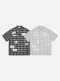 DAXUEN Plaid button-up shirt with graphic patches and embellishments