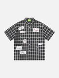 DAXUEN Plaid button-up shirt with graphic patches and embellishments