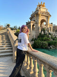 DAXUEN black oversized rocky-coastline graphic tee — model photo