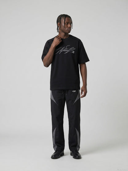 DAXUEN Relaxed-fit short-sleeve T-shirt with script embroidery — model photo