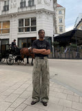 DAXUEN Relaxed-fit short-sleeve T-shirt with script embroidery — model photo