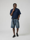 DAXUEN dark blue oversized scripted back graphic t-shirt — model photo
