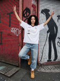 DAXUEN Graphic V-neck t-shirt with embroidered designs — model photo