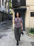 DAXUEN Vintage graphic print short-sleeved T-shirt — model photo