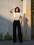 DAXUEN Short sleeve graphic t-shirt featuring Seolness design — model photo