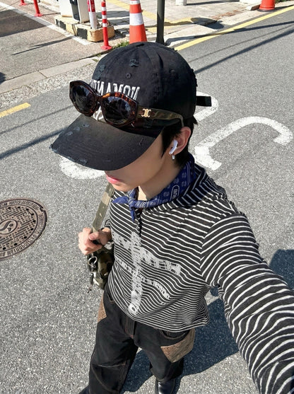 DAXUEN Striped hooded top with graphic print — model photo