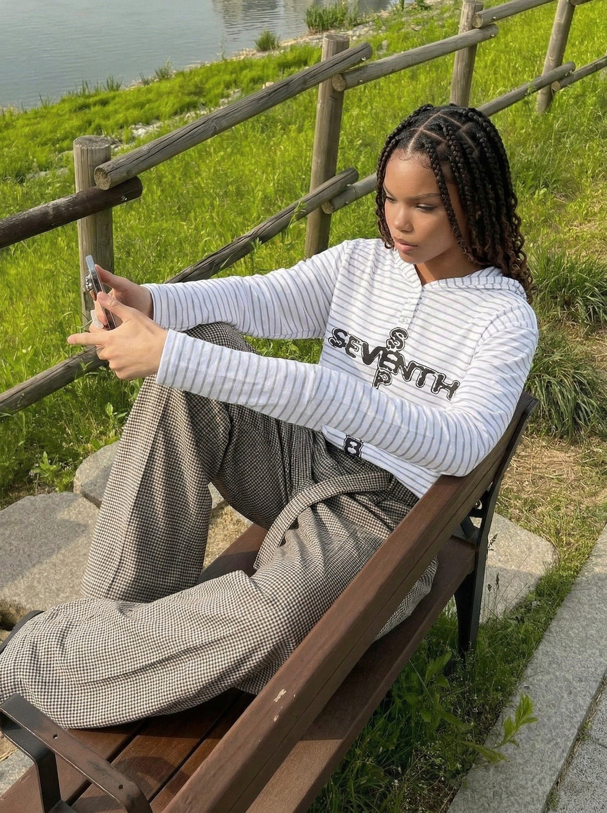 DAXUEN Striped hooded top with graphic print — model photo
