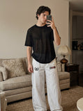 DAXUEN black sheer knit crew neck t-shirt — model photo