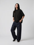 DAXUEN Oversized mock neck top with speckled texture — model photo