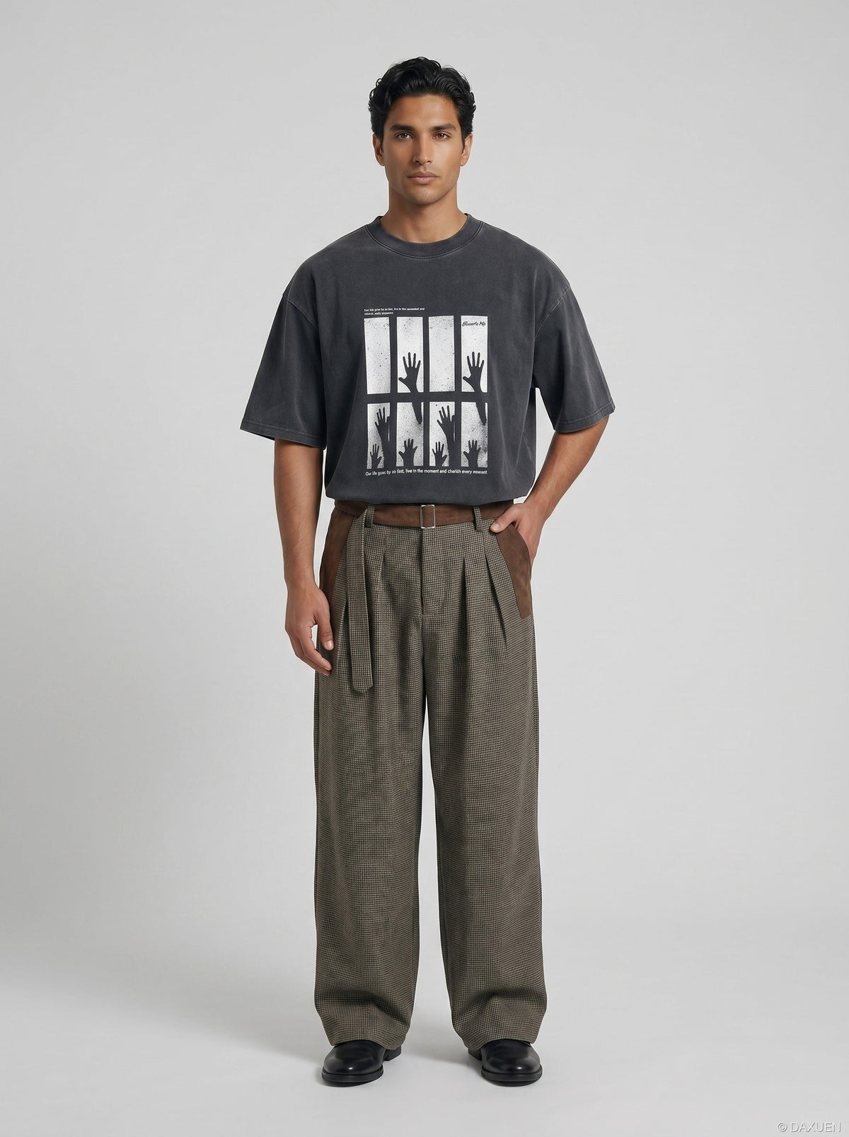 DAXUEN dark charcoal oversized silhouetted-hands graphic tee — model photo