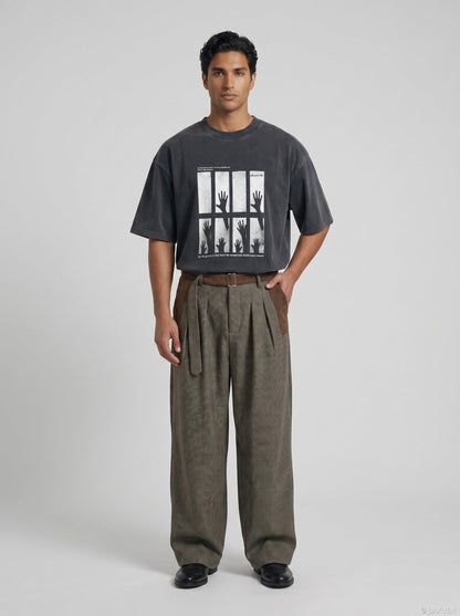 DAXUEN dark charcoal oversized silhouetted-hands graphic tee — model photo