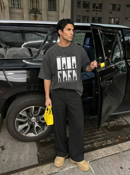 DAXUEN dark charcoal oversized silhouetted-hands graphic tee — model photo