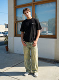 DAXUEN Minimal Logo Relaxed-Fit Tee — model photo