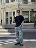 DAXUEN Minimal Logo Relaxed-Fit Tee — model photo