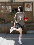 DAXUEN Oversized short-sleeved crew neck graphic t-shirt — model photo