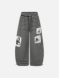 DAXUEN striped wide-leg pants with skull and structure patches