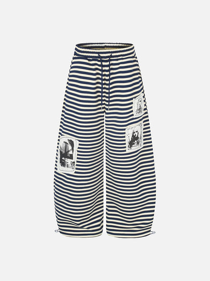 DAXUEN striped wide-leg pants with skull and structure patches