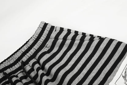 DAXUEN striped wide-leg pants with skull and structure patches