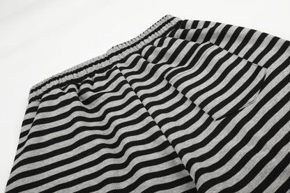 DAXUEN striped wide-leg pants with skull and structure patches