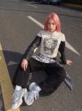 DAXUEN white cropped biker jacket with skull graphic — model photo