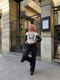 DAXUEN white cropped biker jacket with skull graphic — model photo