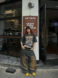 DAXUEN Oversized short-sleeve t-shirt with skull graphic — model photo