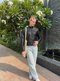 DAXUEN black leather-look jacket with zippered details — model photo