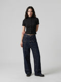 DAXUEN black mock neck buttoned top — model photo